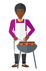 Image showing Man preparing barbecue.