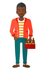 Image showing Man with pack of beer.