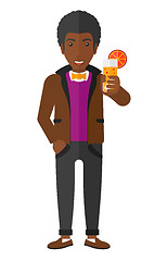 Image showing Man holding glass of juice.