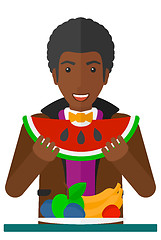 Image showing Man eating watermelon.