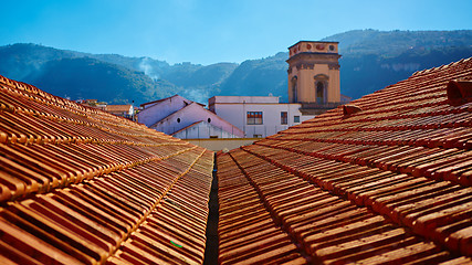 Image showing view of typical vintage house with tile roof