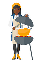 Image showing Woman preparing barbecue.