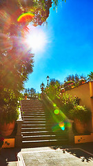 Image showing Brown concrete stair in city garden. 