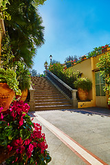 Image showing Brown concrete stair in city garden. 