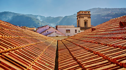 Image showing view of typical vintage house with tile roof