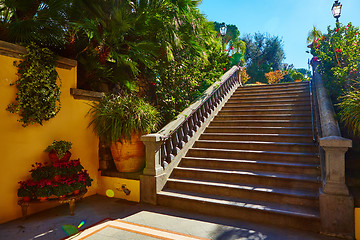 Image showing Brown concrete stair in city garden. 