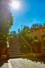 Image showing Brown concrete stair in city garden. 