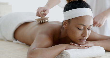 Image showing African Woman Receiving Back Massage