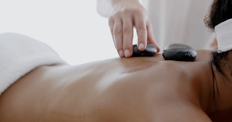 Image showing Woman Receiving A Massage With Hot Stone