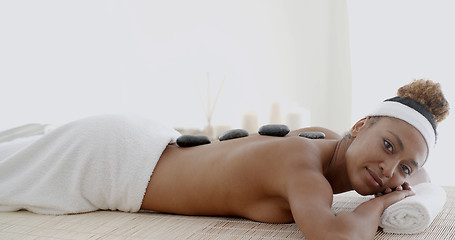 Image showing Woman Getting Hot Stones Massage At Spa