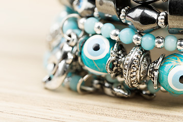 Image showing woman bracelet on wooden background