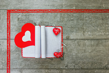 Image showing Gift notebook with red and white hearts