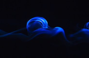 Image showing Dark blue smoke on a black background