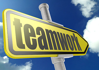 Image showing Yellow road sign with teamwork word under blue sky