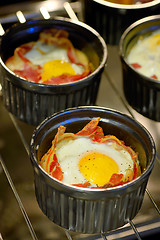 Image showing Breakfast cups egg with bacon