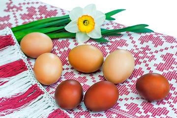 Image showing Easter: colored Easter eggs on the beautiful cloth.