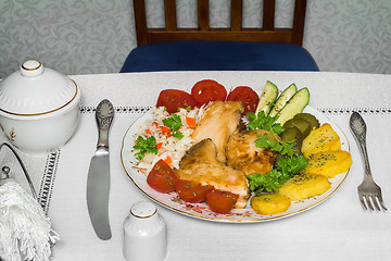 Image showing Baked fish and vegetables . The view from the top.