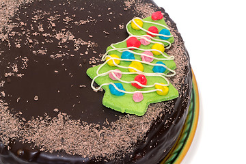 Image showing Chocolate cake on a ceramic dish on white background.