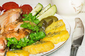 Image showing Baked fish and vegetables .