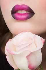 Image showing Woman face with lilac Lips and Rose Flower.