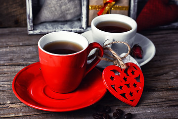 Image showing Cup decorated with wooden hearts