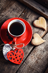 Image showing Cup with wooden hearts