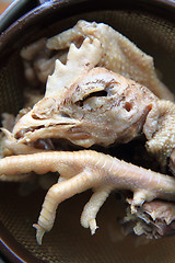 Image showing chicken head and leg as food