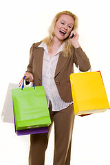 Image showing Excited shopper on the phone