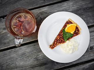 Image showing Pecan pie and cup of tea