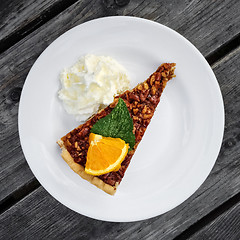 Image showing Pecan pie with whipped cream