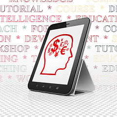 Image showing Learning concept: Tablet Computer with Head With Finance Symbol on display