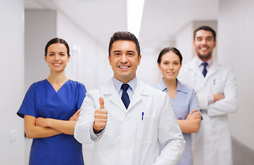 Image showing medics or doctors at hospital showing thumbs up