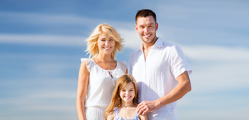 Image showing happy family with blue sky