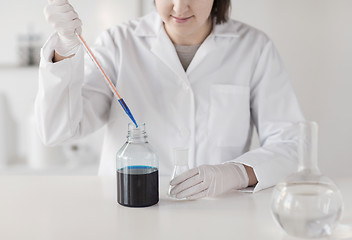 Image showing close up of scientist making test in lab