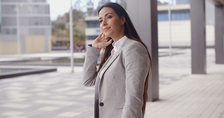 Image showing Grinning optimistic business woman
