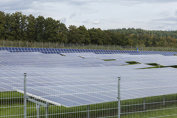 Image showing Field with blue siliciom solar cells alternative energy