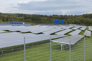 Image showing Field with blue siliciom solar cells alternative energy