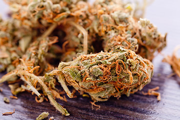 Image showing Close up Dried Marijuana Leaves on the Table
