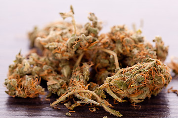 Image showing Close up Dried Marijuana Leaves on the Table