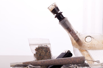 Image showing Close up of marijuana and smoking paraphernalia