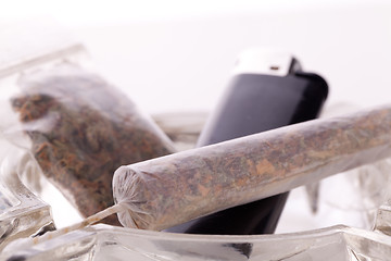 Image showing Close up of marijuana and smoking paraphernalia