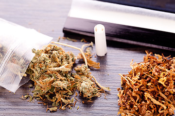 Image showing Dried Cannabis on Rolling Paper with Filter