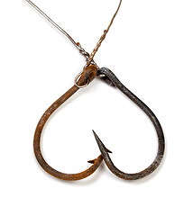 Image showing Old rusty fishhooks in form of heart