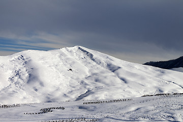 Image showing Snowy mountains at sun morning