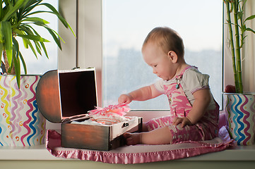 Image showing Girl on sill