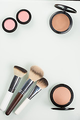 Image showing Set of professional cosmetic: make-up brushes, shadows, Front part.