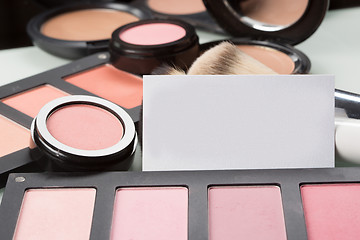 Image showing makeup cosmetics for eyes and bussiness card