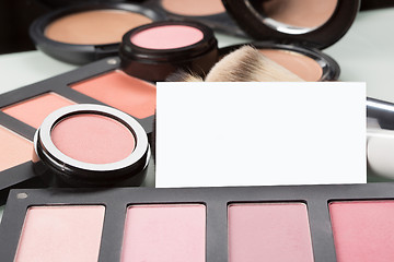 Image showing makeup cosmetics for eyes and bussiness card