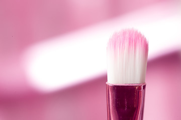 Image showing close-up pink professional cosmetic brush 