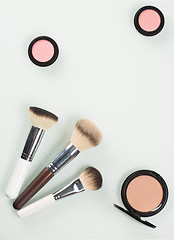 Image showing Set of professional cosmetic: make-up brushes, shadows, Front part.